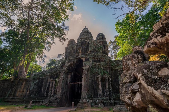 1-Day Amazing Angkor Wat Tour with Sunset & All Interesting Major Temples - Bayon’s stone faces