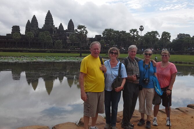 1-Day private Angkor Temple Tour with Sun Rise by Tuk Tuk from Siem Reap - The South Gate and the smiling faces of Bayon