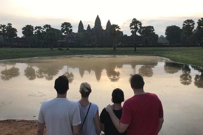 2-D Angkor temple tour with one sunrise in A/C vehicle and guide. - Day one: Ta Prohm, Pre Rup, Banteay Srei, and Banteay Samre