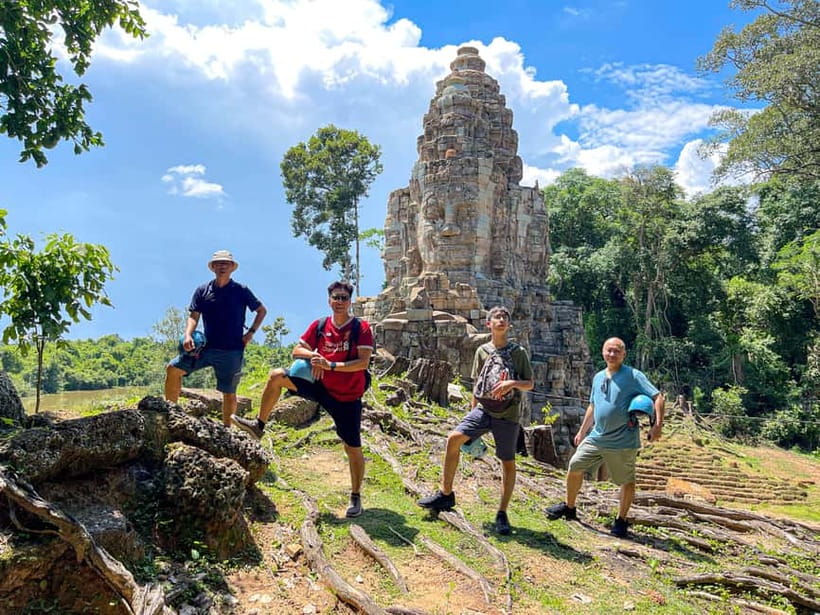 2-Day Angkor Wat, Kulen Mountain, Beng Mealea and Tonle Sap - Ta Prohm, where trees take over the stone