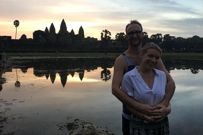 A Day Angkor Wat Sunrise Tour, Ta Prohm & Hidden Gems Beng Mealea - Bayon and the smiling stone faces