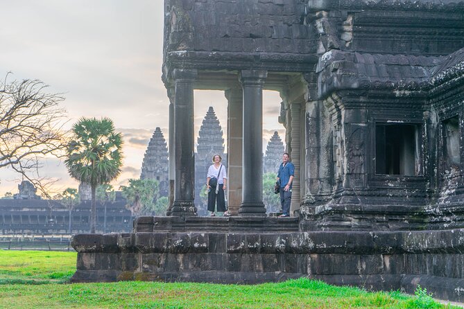 Angkor Adventure Vespa Tour / Tuk Tuk or Car - Angkor Thom and Bayon bring the carved faces
