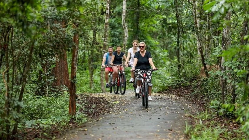 Angkor Jungle Biking Adventure Private Cycling Tour - Through Angkor Thom and past the city gates