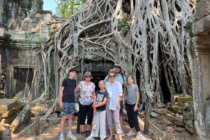 Angkor Sunrise Bike Tour with Lunch Included - Bayon’s carved faces and daily life