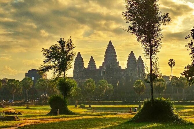 Angkor Sunrise Expedition Cycling Through Serene Backroads - Bayon and the faces of Angkor Thom