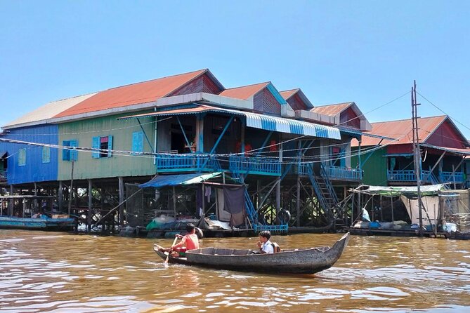Angkor Sunrise & Floating Village Sunset Full-Day Siem Reap Tour - Bayon’s stone faces close the temple circuit