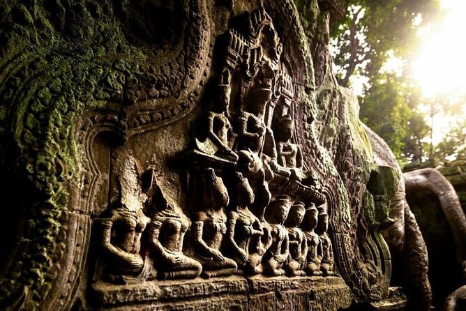 Angkor Sunrise Half-Day Tour with Private Vehicles & Tour Guide - Bayon’s stone faces and one hour of exploration
