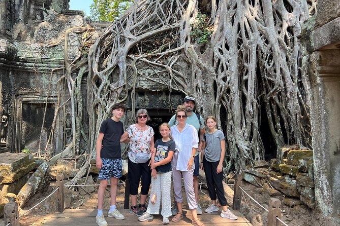 Angkor Wat Bike Tour with Lunch Included - Ta Prohm and the roots over the ruins