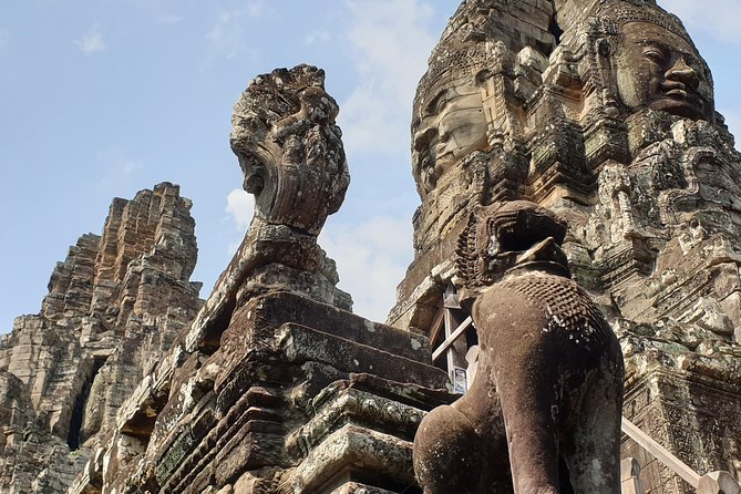 Angkor Wat Full Day Tour in Siem Reap Small-Group - Bayon’s smiling faces and maze-like corridors