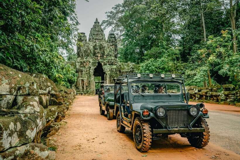 Angkor Wat: Guided Jeep Tour Inclusive lunch at local house - Ta Prohm, where trees claim the ruins
