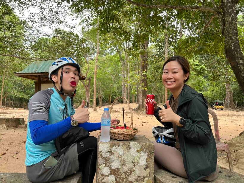 Angkor Wat Sunrise Bike Tour With Lunch Included - Cycling through Angkor Thom at 8 a.m.