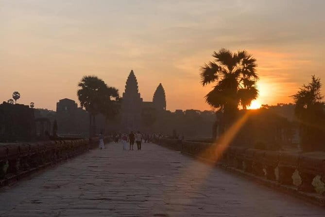 Angkor Wat Sunrise by Tuk Tuk – Personalized Private Tour - Victory Gate and the smiling faces of Bayon