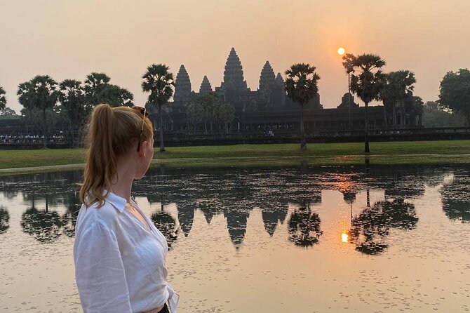 Angkor Wat Sunrise Tour & Archaeological Park Exploration - Bayon’s stone faces and central setting