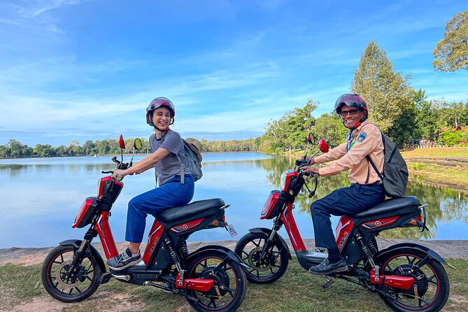 Angkor Wat Sunrise Tour By E-Bike Experience With Breakfast Included - Riding Through Angkor Thom to Bayon