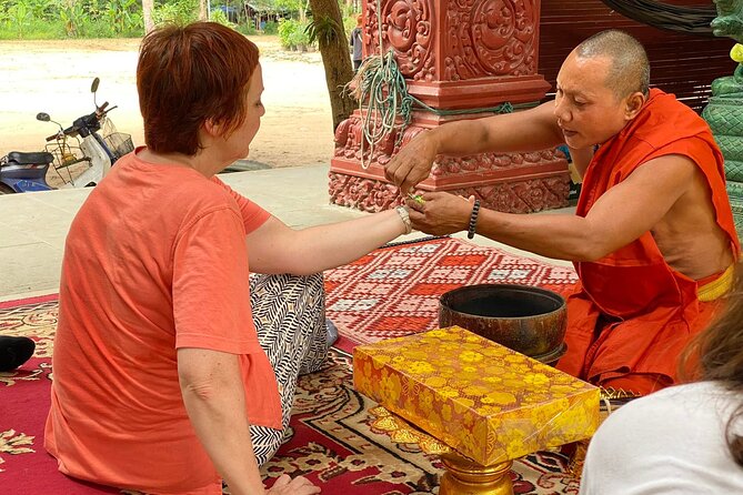 Buddhist Monastery with Monks Water Blessing - From your hotel to the local pagoda