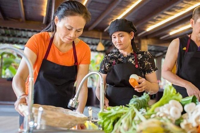 Cambodian Private Cooking Class at a Local's Home - Moving from market ingredients to the cooking station