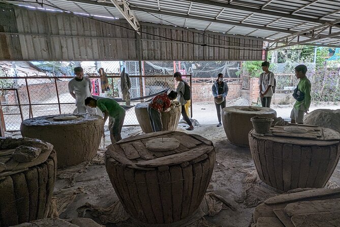 Customs and Culture Half Day Walk and Bike Tour in Battambang - A Buddhist temple and conversation with a young monk
