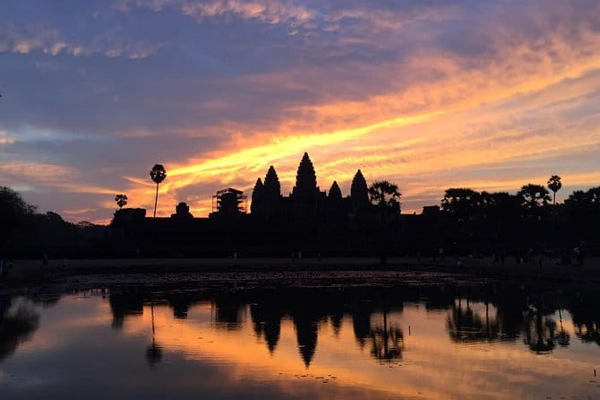 Explore Angkor Sunrise Spectacle a Full Day Temples Tour - Bayon’s calm stone faces