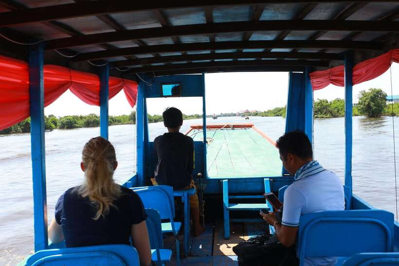 Exploring the Enchanting Kampong Phluk Floating Village - Entering Kampong Phluk’s raised-house community