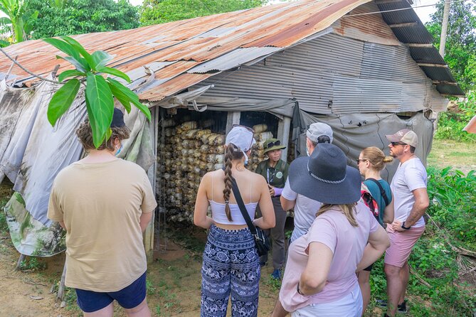 Floating Village Sunset Boat & Jeep Tour - Inclusive Drinks - Meeting a family beside the rice paddies