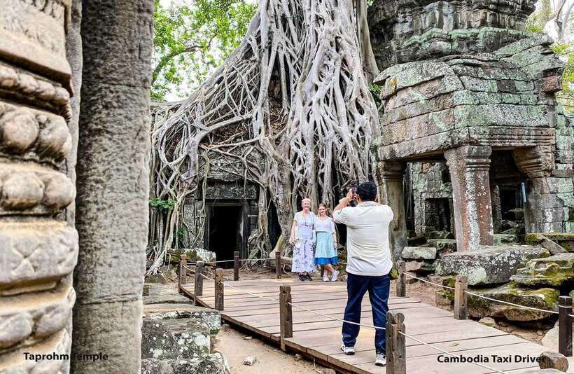 From Phnom Penh: Angkor Wat, Bayon, and Ta Prohm Day Trip - Bayon and the faces of Angkor Thom