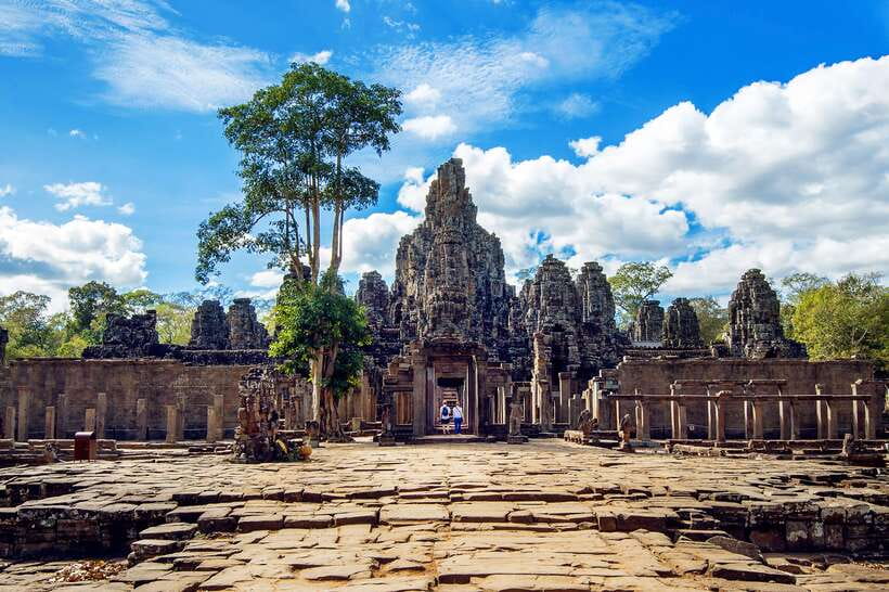 From Siem Reap: Angkor Wat Full-Day Private Tour & Sunrise - Bayon and the famous stone faces