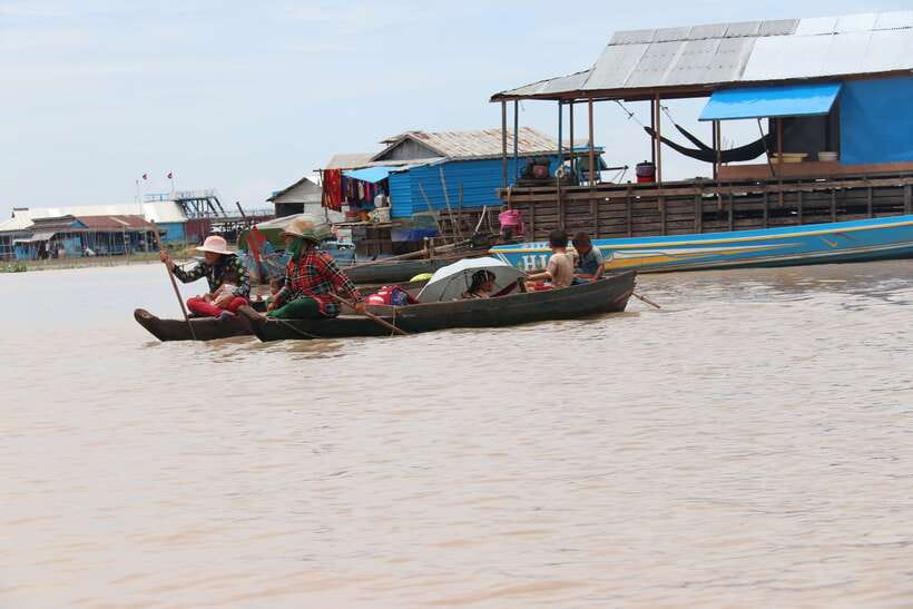 From Siem Reap: Tonle Sap Floating Villages Tour - A village viewed from the water