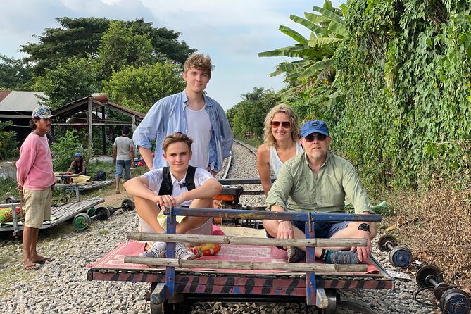 Full day tour by bicycle & tuk tuk,bamboo train,bat cave,villages - Tasting rice paper, banana, and Khmer snacks