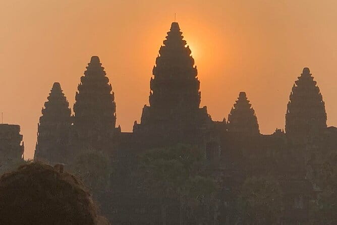 Golden Sunrise at Angkor Wat Private Guided Tour - Bayon’s smiling faces reward close attention