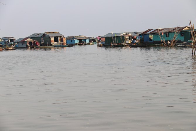 Guided Floating Village Boat Tour in Siem Reap - Boarding the Long-Tail Boat at Tonle Sap