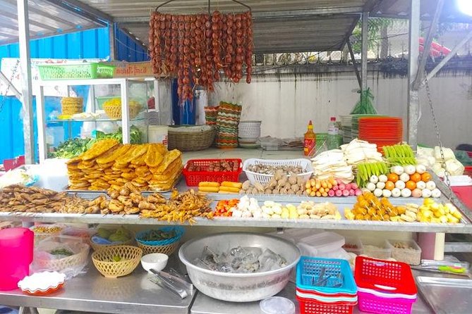 Half Day - Phnom Penh Food Tour - Phnom Penh Night Market: food, clothes, and evening crowds