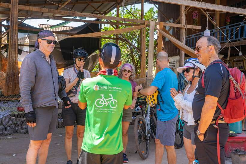 Kampong Phluk: Floating Village Sunset Bike Tour or E-Bike - Arriving at Kampong Phluk’s tall stilt houses