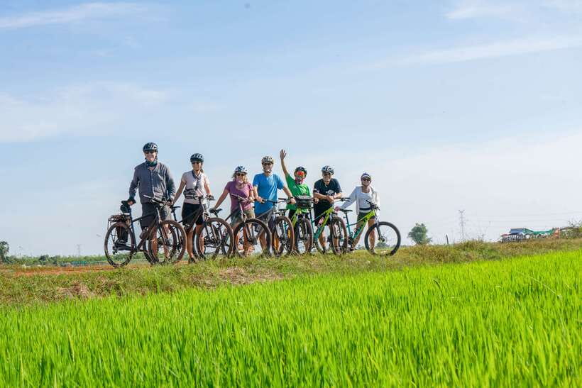 Kampong Phluk: Floating Village Sunset Bike Tour or E-Bike - Seeing schools, a market, and a pagoda by boat