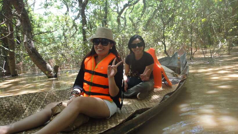 Kompong Phluk Floating Village Tour from Siem Reap - The flooded forest by small rowing boat