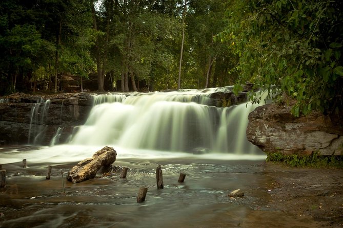 Kulen Waterfall and 1000 Lingas River Private Tour - Cooling off at Kulen Waterfall