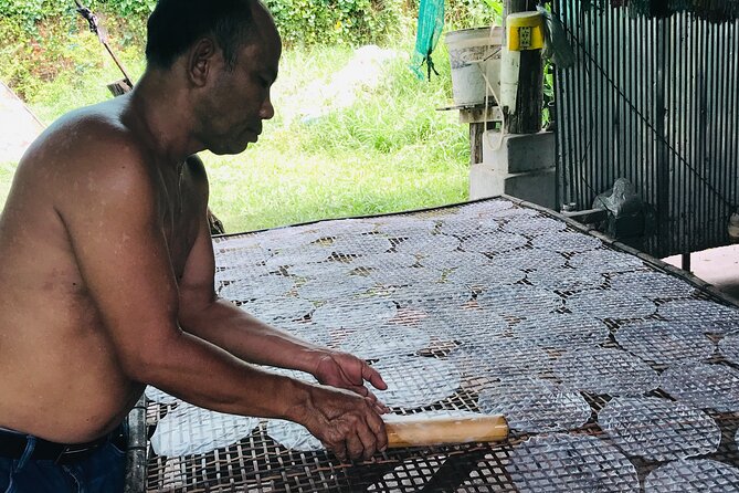 Morning village tour Livelihood tour with Local Product discover - Inside a traditional rice wine distillery
