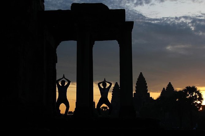 One Day tour with sunrise in car with A/C or Van & Guide. - Sunrise at Angkor Wat before the day heats up