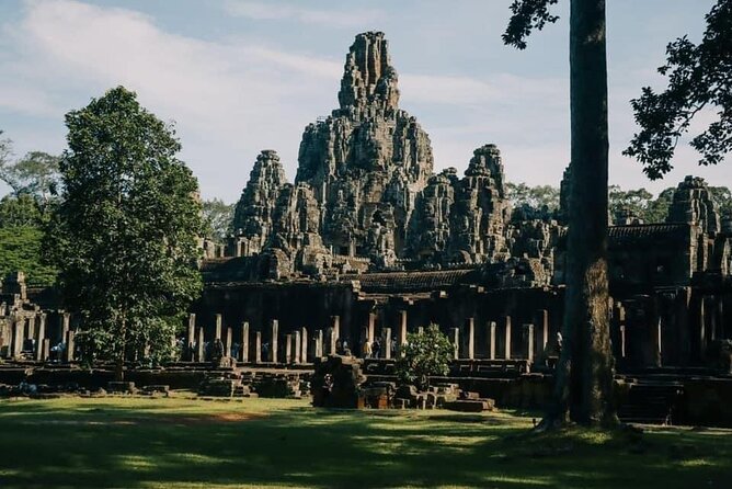 One Full Day Private tour of Angkor Wat, Ta Prohm, Angkor Thom & Banteay Srie - Ta Prohm, where stone meets jungle