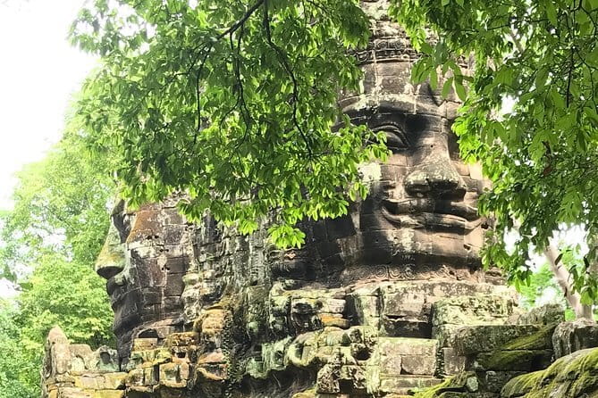 Personalised Angkor Wat Sunrise Off-the-Beaten Track Tour - Bayon’s stone faces and central setting