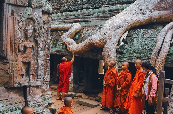 Personalised Angkor Wat Sunrise Tour by TukTuk - Bayon’s stone faces