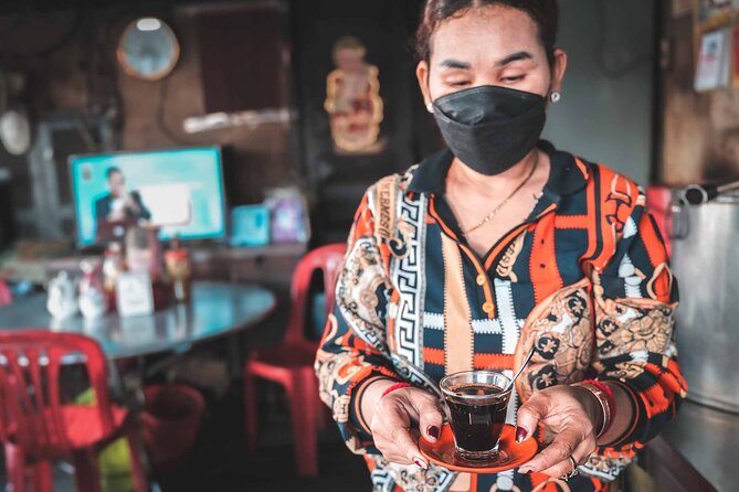 Phnom Penh Morning Market & Food Tour by Tuktuk - Includes All Food & Drinks! - Stop three: pork and rice at a family-run shop