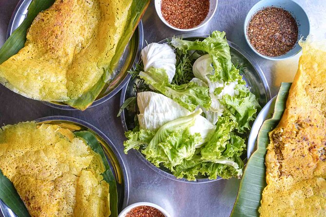 Phnom Penh Morning Market & Food Tour by Tuktuk - Includes All Food & Drinks! - Stop four: yellow turmeric crepes