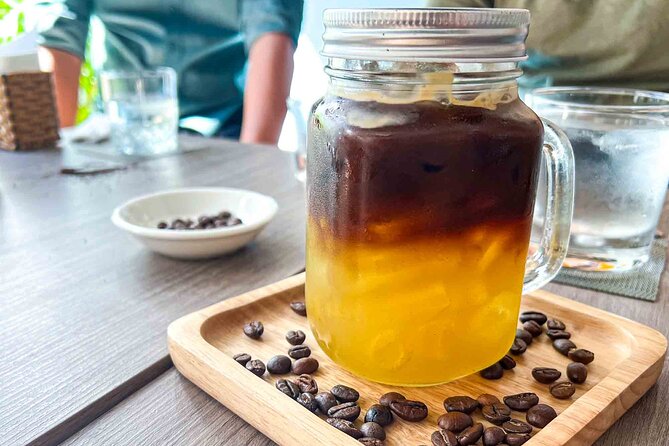 Phnom Penh Morning Market & Food Tour by Tuktuk - Includes All Food & Drinks! - Stop five: coffee at Kompi Coffee
