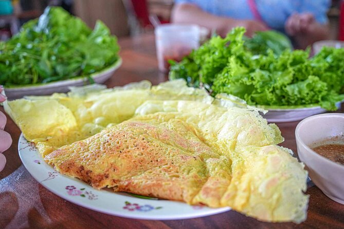 Phnom Penh Morning Market & Food Tour by Tuktuk - Includes All Food & Drinks! - Stop one: noodle soup and local coffee