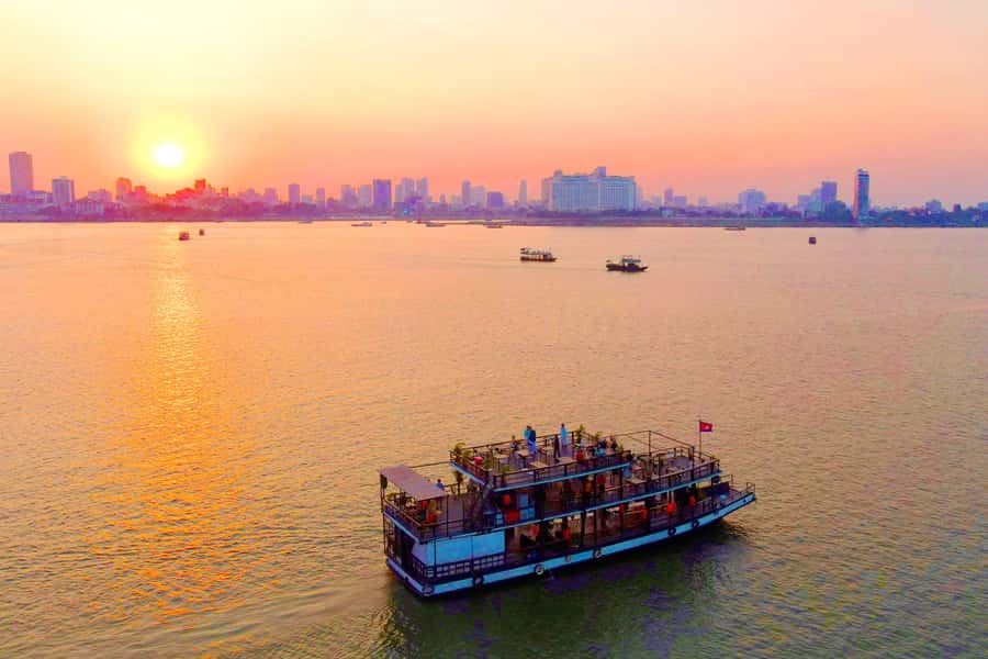 Phnom Penh: Sunset Cruise with Unlimited Beer &Fruit platter - The first 40 minutes: bridges, monuments, and river geography