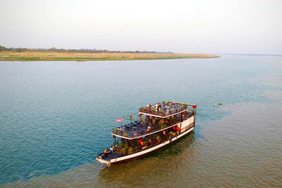 Phnom Penh: Sunset Cruise with Unlimited Beer &Fruit platter - Drinks, fruit, and the sunset portion