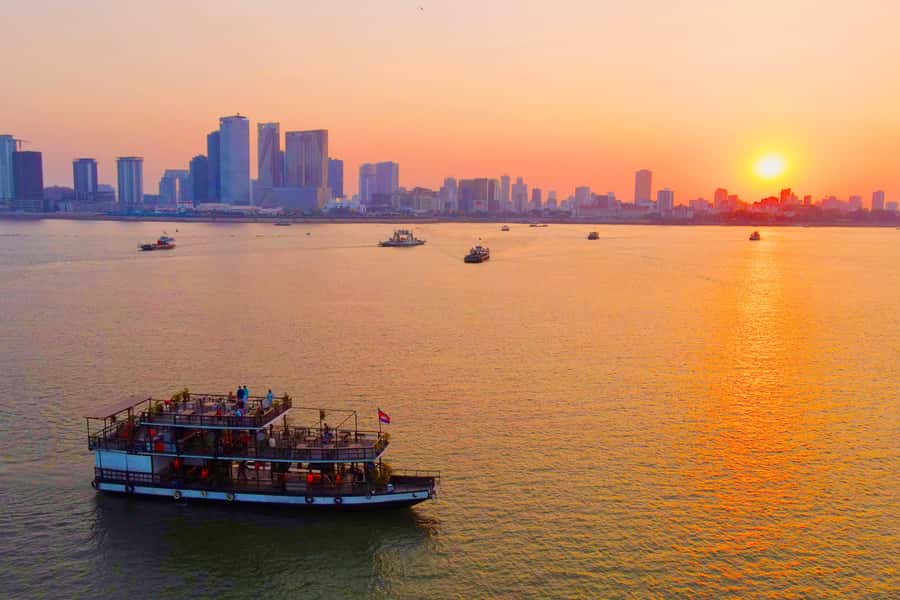 Phnom Penh: Sunset Cruise with Unlimited Beer &Fruit platter - Getting to the boat by tuk-tuk