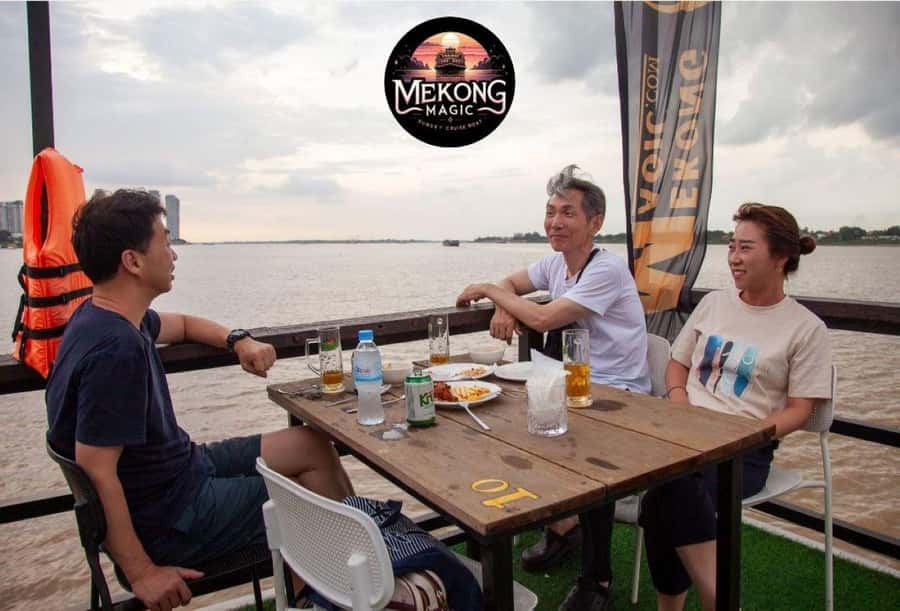 Phnom Penh: Sunset Cruise with Unlimited Beers & BBQ Buffet - Phnom Penh from the river: what you will see