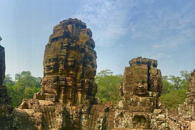 Private Day Angkor Wat Temple and Banteay Srei Temple Tour - Ta Prohm begins the day among tree roots