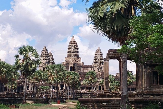 Private One Day Tour with Sunrise at Angkor Wat - Angkor Thom’s South Gate and the face towers of Bayon